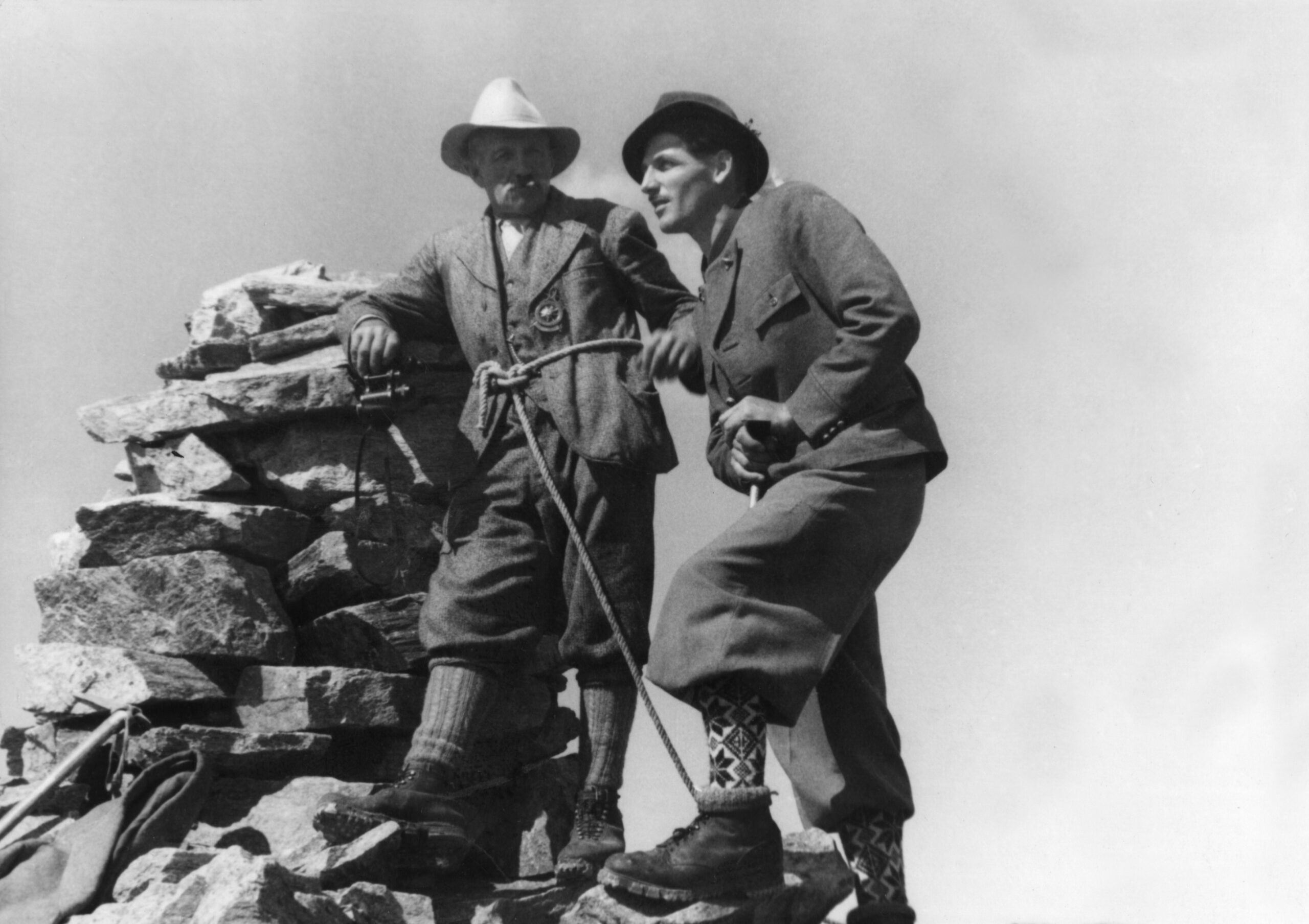 Historic photograph of Ferdinand Falch with his son Richard Falch in the mountains of St. Anton am Arlberg
